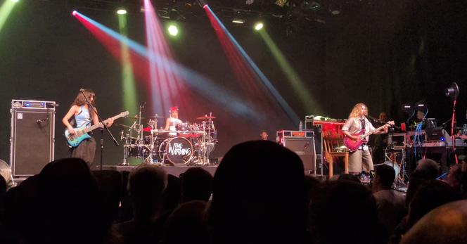 View in the Stage, all 3 members are visible playing their Instruments