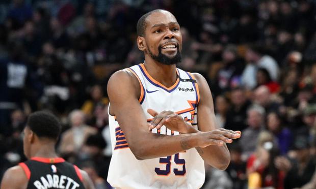 Feb 23, 2025; Toronto, Ontario, CAN; Phoenix Suns forward Kevin Durant (35) gestures to the referee for a foul call against the Toronto Raptors in the second half at Scotiabank Arena. Mandatory Credit: Dan Hamilton-Imagn Images