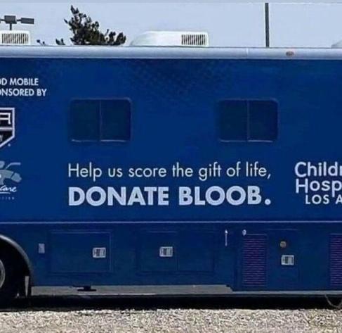 Blood donation truck that says "donate Bloob"