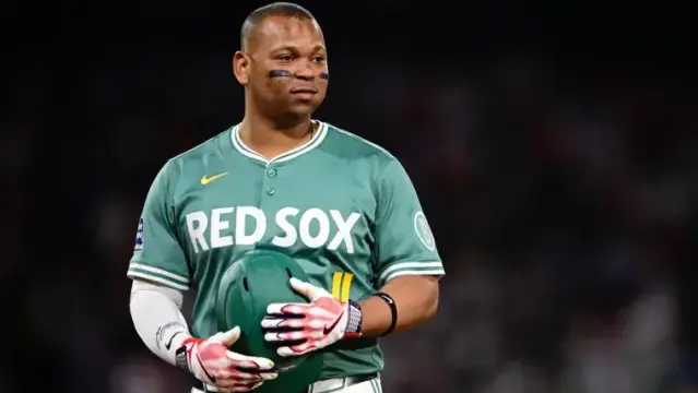 What position does Rafael Devers play? Giants star backtracks on first base comments after Red Sox exit image