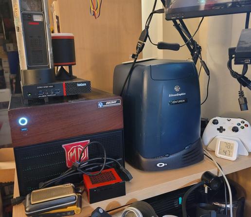 A silicon graphics O2 workstation. It's a somewhat squat dark blue device. The front says silicon graphics and O2.