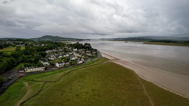 aerial shot over coast and town