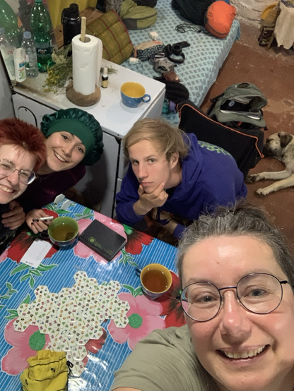 Selfie with a game & 3 people & a sleeping dog