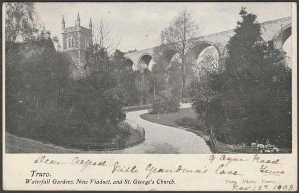 Printed monochrome postcard showing a view of Victoria Gardens in Truro, Cornwall and with the viaduct and St George's Church behind.

Published by Tims, Photo, Truro, not numbered.

Postally used on 19 November 1903 with squared circle Truro cancellation on red one penny stamp and sent to Master A.D. Chegwin, Pogo Aucho, Linares, Province de Jaen, Spain.

Very good condition, with very slight corner bumps.