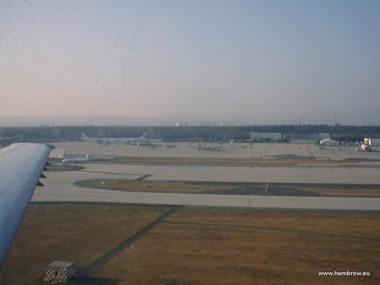 Frankfurt airport from the ground, with a selection of cargo aircraft in the background. These were coming and going in great numbers while I stood in the civilian terminal at the opposite side of the airport, watching them bring lots and lots of bombs to drop on the Iraqi people.