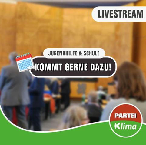 Zu sehen ist eine Totale des Plenarsaals unseres Düsseldorfer Rathauses. In einem weißen Kasten mit abgerundeten Ecken steht in schwarzer Sprache "Jugendhilfe & Schule". Darunter steht in einem anthrazitfarbenen Kasten mit weißen Buchstaben: „Kommt gerne dazu!"