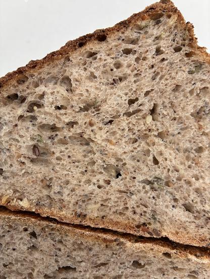 Crumb shot showing a darker loaf using 15% black wheat.
