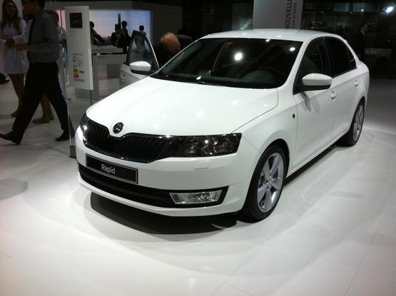 White modern Skoda Rapid hatch, front quarter view