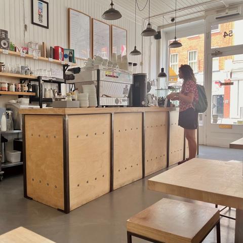Store St Espresso
Inside view, a customer at the wooden counter