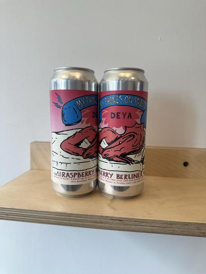 Two cans of beer on a table, arranged such that the text spans them. There is a picture of some kind of lizard, above that the text  " phones on snooze"
At the bottom, it says raspberry berliner and declares that it is 7.2% alcohol