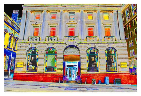 Colour adjusted photograph (overly colourful with a black sky) showing a Georgian listed building which is now a restaurant.
