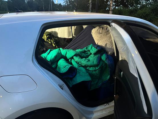 Tonight’s hotel: my little e-Golf 🚗🌙
Trying something new sleeping in the back of my tiny electric car.
I’m 1.80m tall, so it’s a tight squeeze… but the freedom is worth every cramped inch. 😄

No tent tonight, just a sleeping bag, a packed car, and the quiet night outside.
Let’s see how well I sleep curled up like a pretzel.

📍 Somewhere on the road