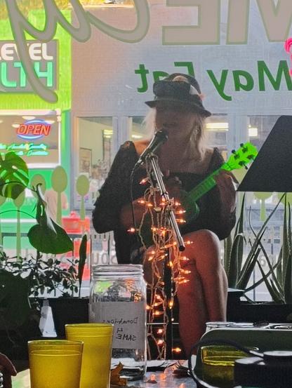 My partner Grem playing Johnny hobo at open mic.