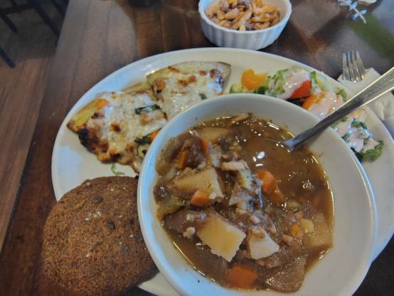 Veggie pizza, fruit salad, some kinda delicious soup and a chocolate oatmeal cookie from the pay what you can Cafe at open mic night.