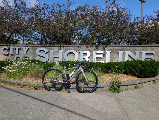 My road bike in front of the big sign that says "City of Shoreline," Shoreline, WA