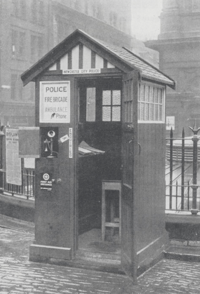Wooden police box of the type instituted by Crawley for Newcastle City Police. Note the public-facing telephone and first aid boxes mounted to the left of the door. From The Police Journal, vol.1, No.1, January 1928