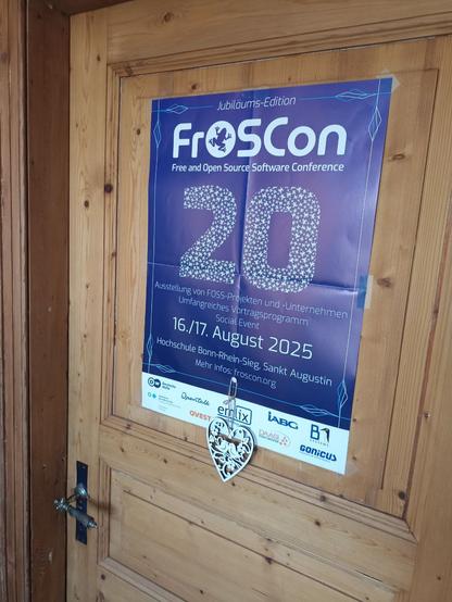 Poster an der Tür für die 20igste FrOSCon - 16./17. August in Sankt Augustin Bonn.