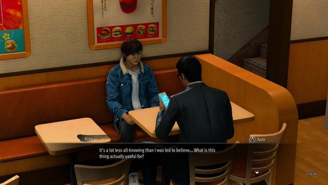 Screenshot from Like a Dragon Gaiden: The Man Who Erased His Name. Kiryu: "It's a lot less all-knowing than I was led to believe... What is this thing actually useful for?"