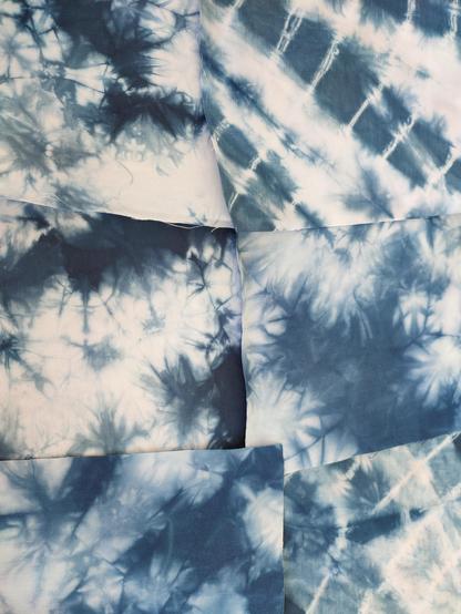 Six small  indigo dyed fabric squares