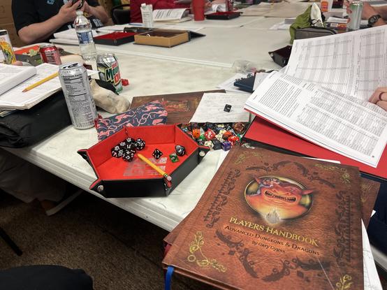 Dice snacks and books.