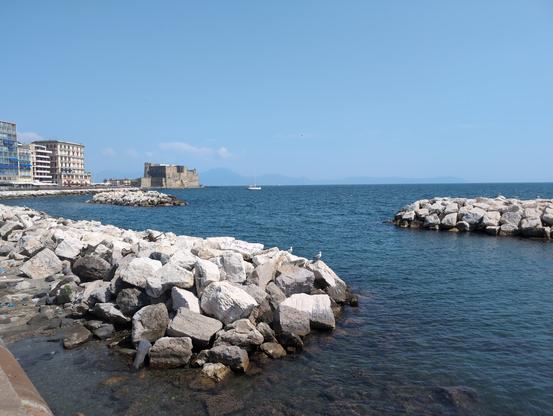 Napoli. Italy. Sea. Sky. Rocks. Ovo Castle. Blue sky and blue sea.