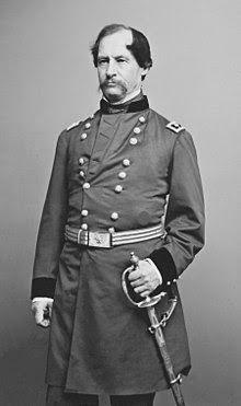 General David Hunter poses in uniform hand on sword.