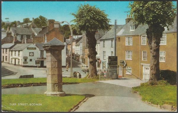 Printed colour postcard showing a view of Turf Street in Bodmin, Cornwall.

Published by J. Salmon Ltd, Sevenoaks, No 1-45-16-01J.

Postally used on 16 September 1982 with Bodmin cancellation on pastel green 12½p stamp and sent to Coventry.

Good condition, with very slight corner bumps, but small crease to bottom left corner.