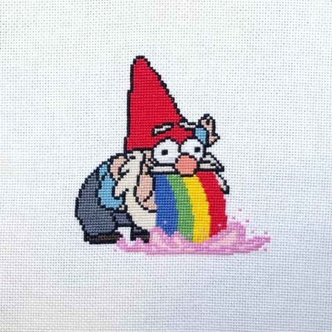 A finished cross stitch project of a gnome from the cartoon Gravity Falls (specifically, it’s Steve) puking rainbows.
(From the episode “Tourist Trapped”)