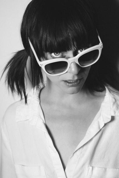 portrait of a russian-american singer / songwriter, hamming it up in front of the camera