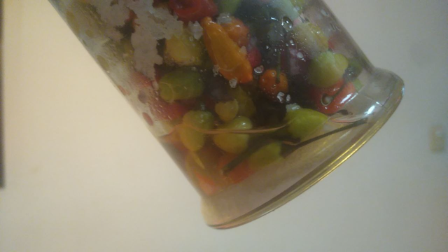 Water accumulates at the bottom of the flask.