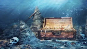 under water scene of a treasure chest sunken ship and skull