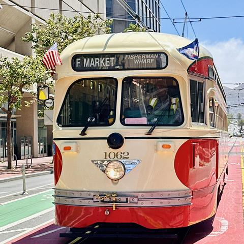 A photo of a street car in San Francisco with the letter F, and it says Fisherman’s Wharf