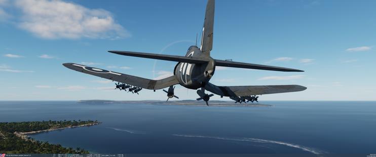 F4U Mk4 Corsair flying over 1944 Guam carrying 8 standard rockets and 2 very large rockets.