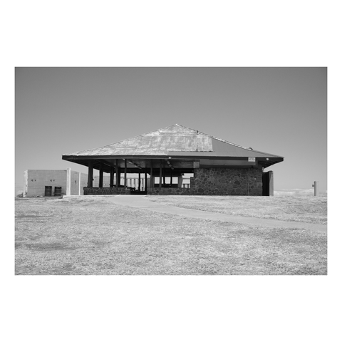 facade of beach pavilion with sky behind