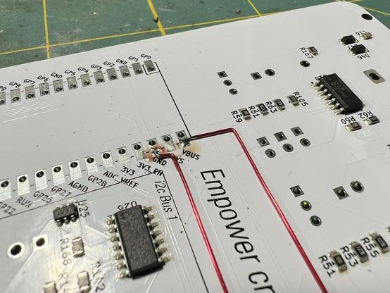 The jumped traces in red, powering the multiplexer that allocates analog input values so they cone through the microcontroller as separate channels, rather than channel 1’s value 8 times, which is happening now.