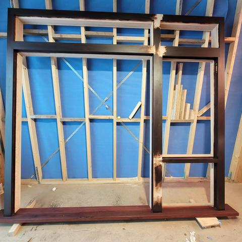 A window frame with the external side (mostly) painted with linseed oil paint.