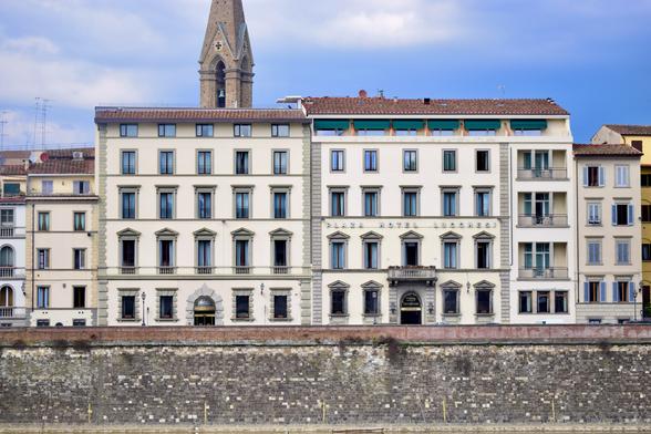 Photo. Looking across the Arno in Florence towards the windows that dominate the riverside