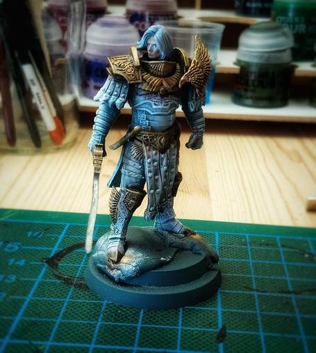 Half painted miniature of 30k Fulgrim. Metal parts and face and hair are finished, rest is unpainted.