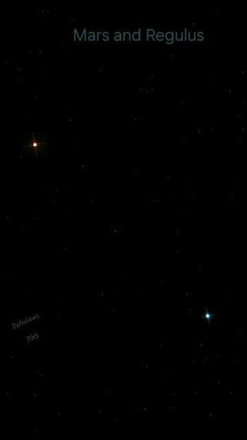 In the upper right hand corner the bright orange glow of Mars shining brightly like a star is set against a sea of black and tiny white stars... all the way at the bottom right sits the light blue star regulus. They make quite a pair in one shot.