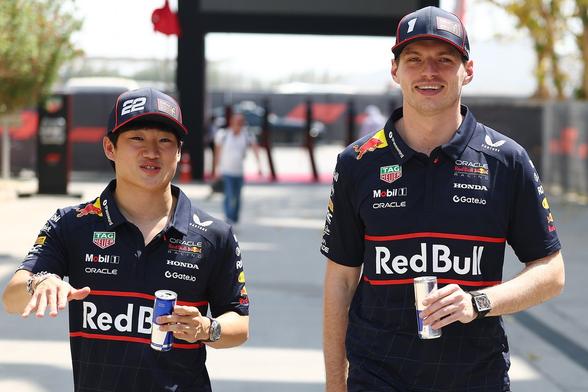 Yuki and Max walk through the paddock in Bahrain.