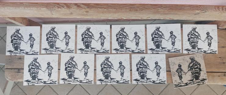 a linocut inspired by Banksy's "Soldier".