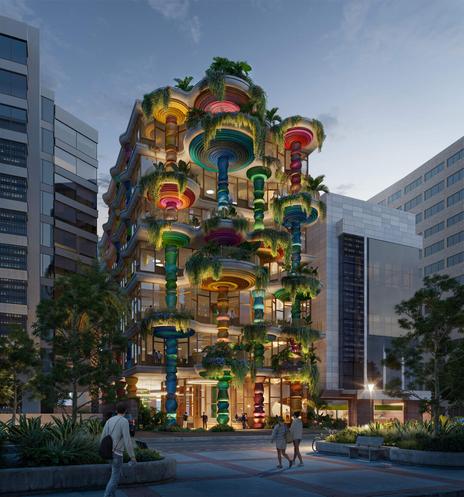 New building in Bogota that's designed round really bright colorful columns, with giant bowls on top filled with green. Dusk image with internal lighting showing through.