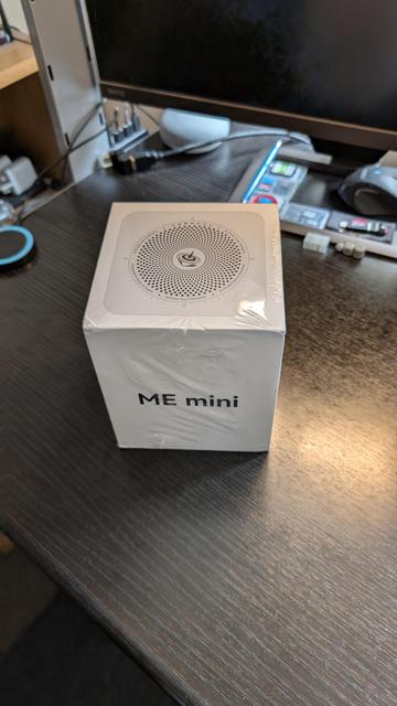 White shrink-wrapped box containing a BeeLink ME mini NAS