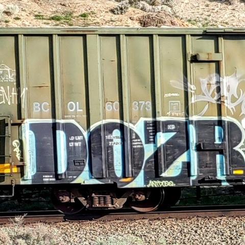 Train car with graffiti rolling through Kamloops BC Canada