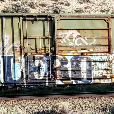 Train car with graffiti rolling through Kamloops BC Canada