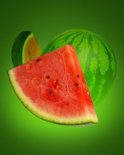 Whole watermelon in the background with striped green rind. In the foreground, a large triangular slice shows vibrant red flesh and small black seeds, with a green rind edge. A smaller slice is angled to the left, revealing orange-hued flesh. Green gradient background.