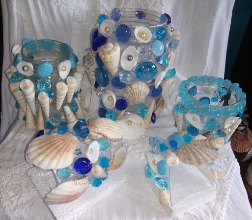 an assortment of aquarium decorations in blues and shells