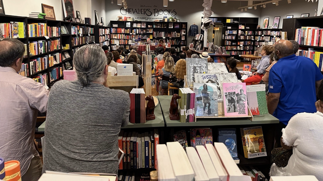 Book signing event at Chevalier’s Books, standing-room only crowd