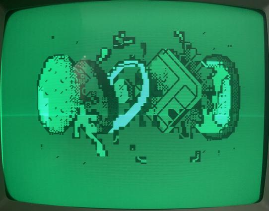 A PETSCII rendition of a hamburger, exploding into its pieces with an added floppy disk.