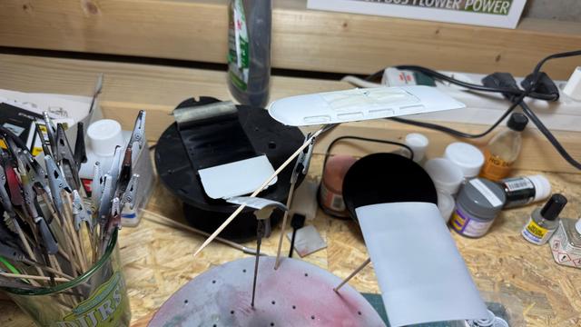 Painted parts of a VW T1 Samba Bus by Revell in 1:24.